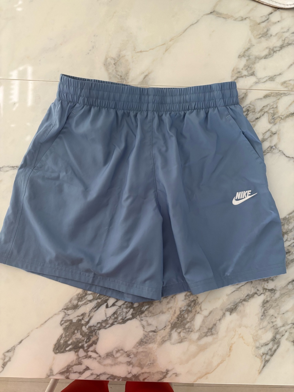 Nike Light Blue Kids Athletic Shorts with White Swoosh